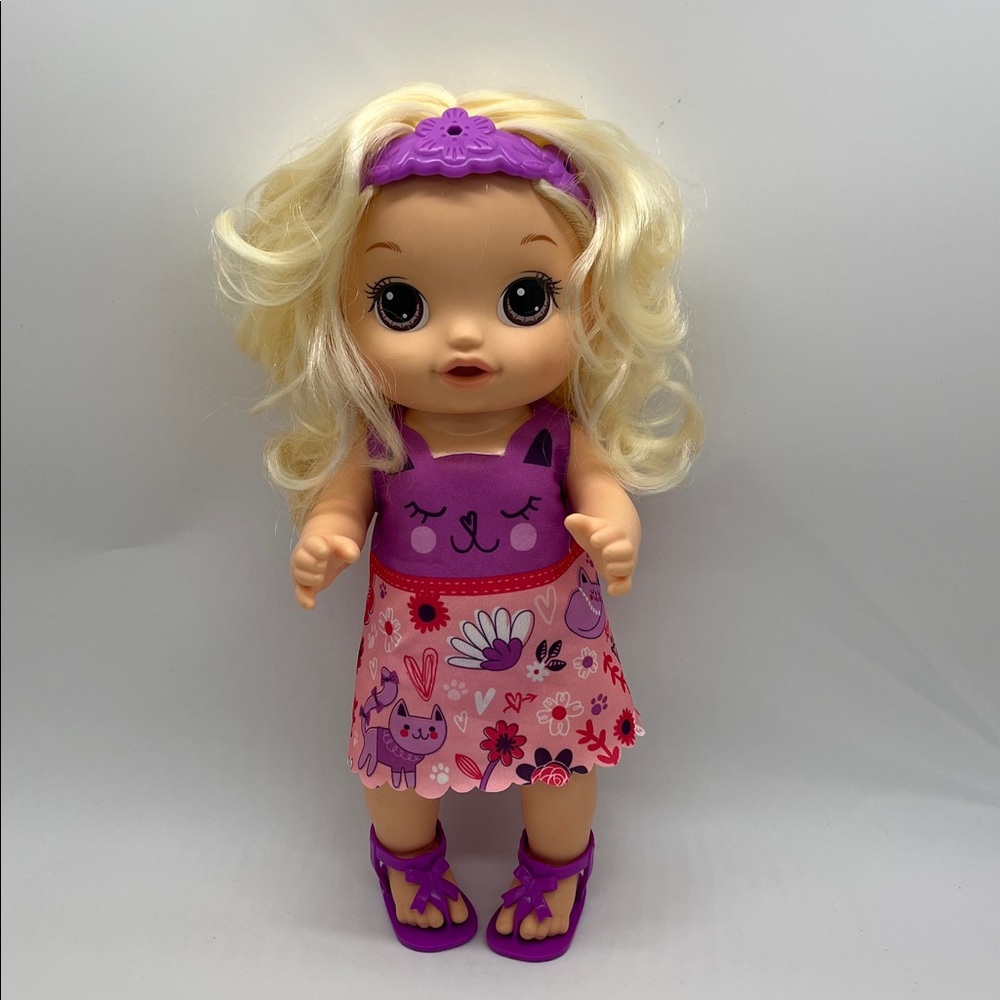 Adorable Blonde Doll with Pink Dress